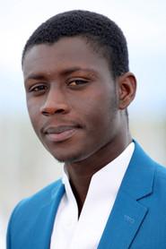 Amadou Mbow as Assane in Patience (Sabali) 2025