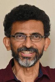 Sekhar Kammula as Kotigadu (Voice) in Godavari 2006