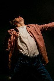 Ryan Robertson as The Man in Black in Burst Bubbles 2026