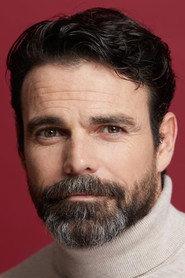 Javier Alcina as Daniel in Nato 0. El origen del mal 2023
