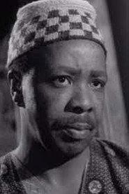Lionel Ngakane as Nimrod in Nor the Moon by Night 1958