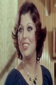 Faten Fouad as صديقة صلاح فؤاد in Tit for Tat 1984