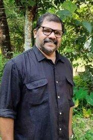 Rajesh Azhikkodan as Binu Thankachan in Madanolsavam 2023