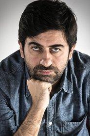 Emin Alper as Eşkiya #1 in A Tale of Three Sisters 2019