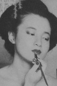 Midori Yūzaki as Nanae Kobayashi in Rapist in Uniform: A Sexual Demon 1986