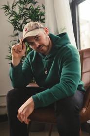 Zachary Blair as The Roommate in The Skull and the Arm 2023