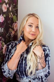 RaeLynn as Alexis Rinehart in A Nashville Christmas Carol 2020