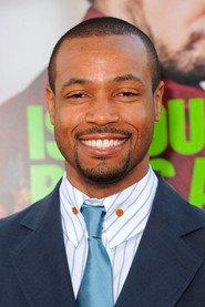 Isaiah Mustafa as Coach Evans in Crush 2013
