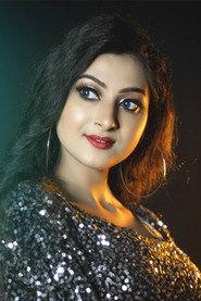 Nisha Deb as Actress in Achena Shahar 2021