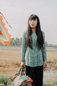 Lê Minh Dũng as Hồng Hoa/Hùng in Mouth of Life 2022