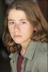 Bodhi Rainn Riggio as Son on Street in river man 2026