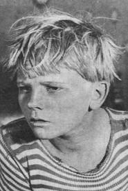 Vasyl Liudvynskyi as Elevator boy in Behind the Wall 1928