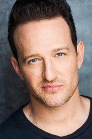 Justin Sintic as District Attorney Mullins in What Freedom