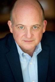 Jeffrey Bean as Phil McGloughlin in Breed of Greed 2025