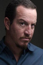 Andrés Crespo as Angel in Prometeo Deportado 2010