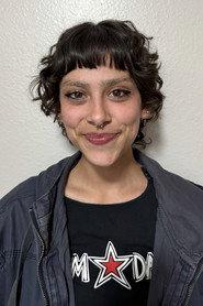 Victoria Martins as Ms. Johnson in Alone Again 2022