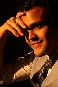 Flávio Denner as Carlos in Treble Clef 2024
