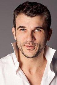 Sebastian Barrio as Commissaire Lavant in All the Gods in the Sky 2019