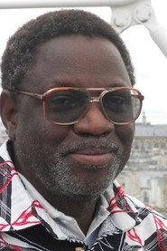 Michel Ange Nzojibwami as Colonel Théoneste Bagosora in Shake Hands with the Devil 2007
