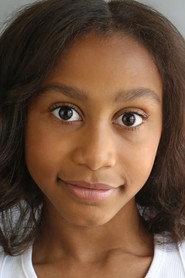 Melaniya Ramsay as Young Cora in Cora, Eat Your Spaghetti