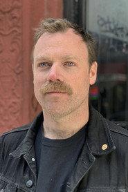 Clemens Poole as Narrator (voice) in Explosions Near the Museum 2023