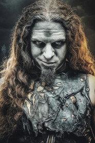 David Vogt as Charles Greywolf (bass/rhythm guitar) in Powerwolf: The Monumental Mass: A Cinematic Metal Event 2022
