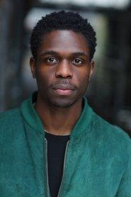 Jordan Peters as Mandal in A Witness 2025