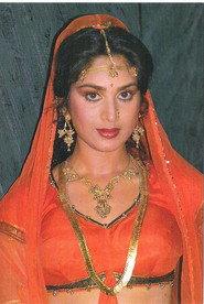 Meenakshi Sheshadri as Sarah ( Vinod's wife) in Humshakal 1992