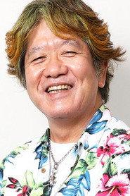 Hiroshi Butsuda as Director Butsuda in Kamen Rider × Super Sentai × Space Sheriff: Super Hero Wars Otsu: Heroo! Answers 2013