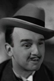 Max Dalban as Bernard, the colleague in La Chienne 1931