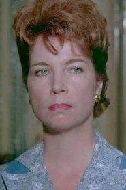 Patricia Karim as Mme Paul Suzanne Chaudard, fille d'instituteur in The Seventh Company Outdoors 1977