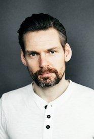 Kolbeinn Arnbjörnsson as Lawyer in And Breathe Normally 2018