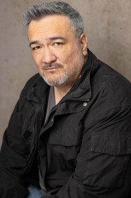 Mike A. Morgan as Eddy in An Unexpected Christmas Plan 2026
