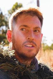 Andrew Scites as Phil in I Am Spaceman 2024