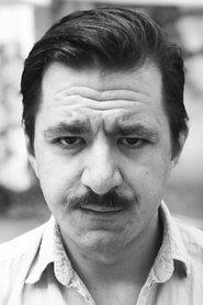Lucian Iftime as Receptionerul in When Evening Falls on Bucharest or Metabolism 2013