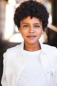 Baeyen Hoffman as Charlie in Six Degrees of Santa 2022