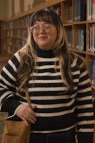 Melody Yang as Novella Vision in Diebrary: Reading Kills 2024