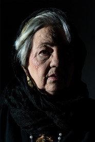 Mila Cunha as Maria Dolores (Avó) in Matryoshkas 2026