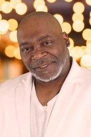Jon Cesar as Albert in Stationed At Home 2025