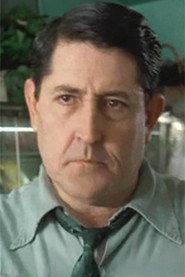 Dana Craig as Mr. Mueller in Running Time 1997