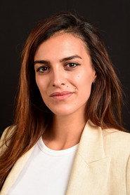 Dina Amer as Adult Hasna in You Resemble Me 2022