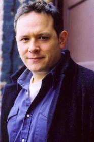 Trevor Martin as The Detective in Six Guns for Hire 