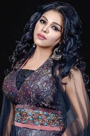 Alaa Najm as Iman (woman) in Songs of Adam 2024