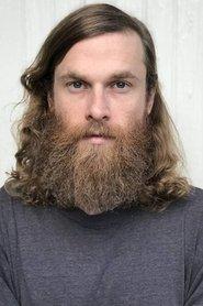Elijah Ungvary as Tennis Instructor in John and the Hole 2021