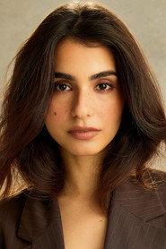 Aditi Sandhya Sharma as Female Protagonist in The Storm, the Calm. The Madness, the Magic. 2025