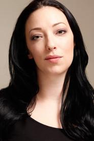 Amelia Tyler as Monitoring Officer / Waitress / Brain Slave / Voice of 'Q Machine' in Triple Hit 2009