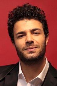 Vural Şahanoğlu as Kasiyer in In Good Hands 2022