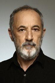 Stelios Mainas as Giannis' Father (62 years old) in Giannis in the Cities 2024