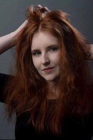 Abby Haley as Bar Guest in A Tailor-Made Romance 2025