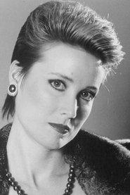 Deborah Rennard as Sly Lovegren in Dallas: J.R. Returns 1996